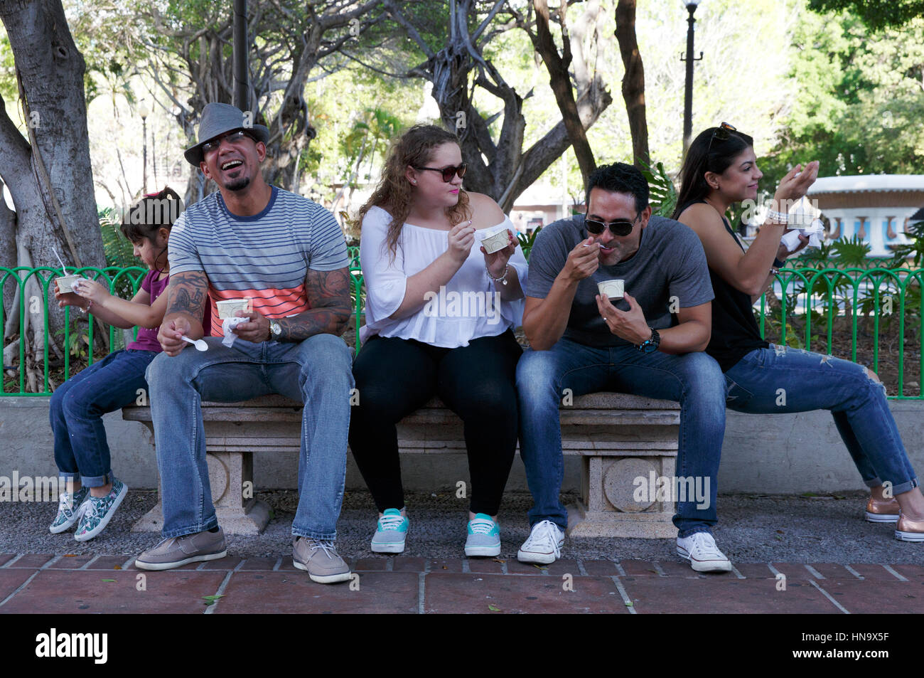 People eating ice cream in Plaza Degetau park, Ponce, Puerto Rico Stock