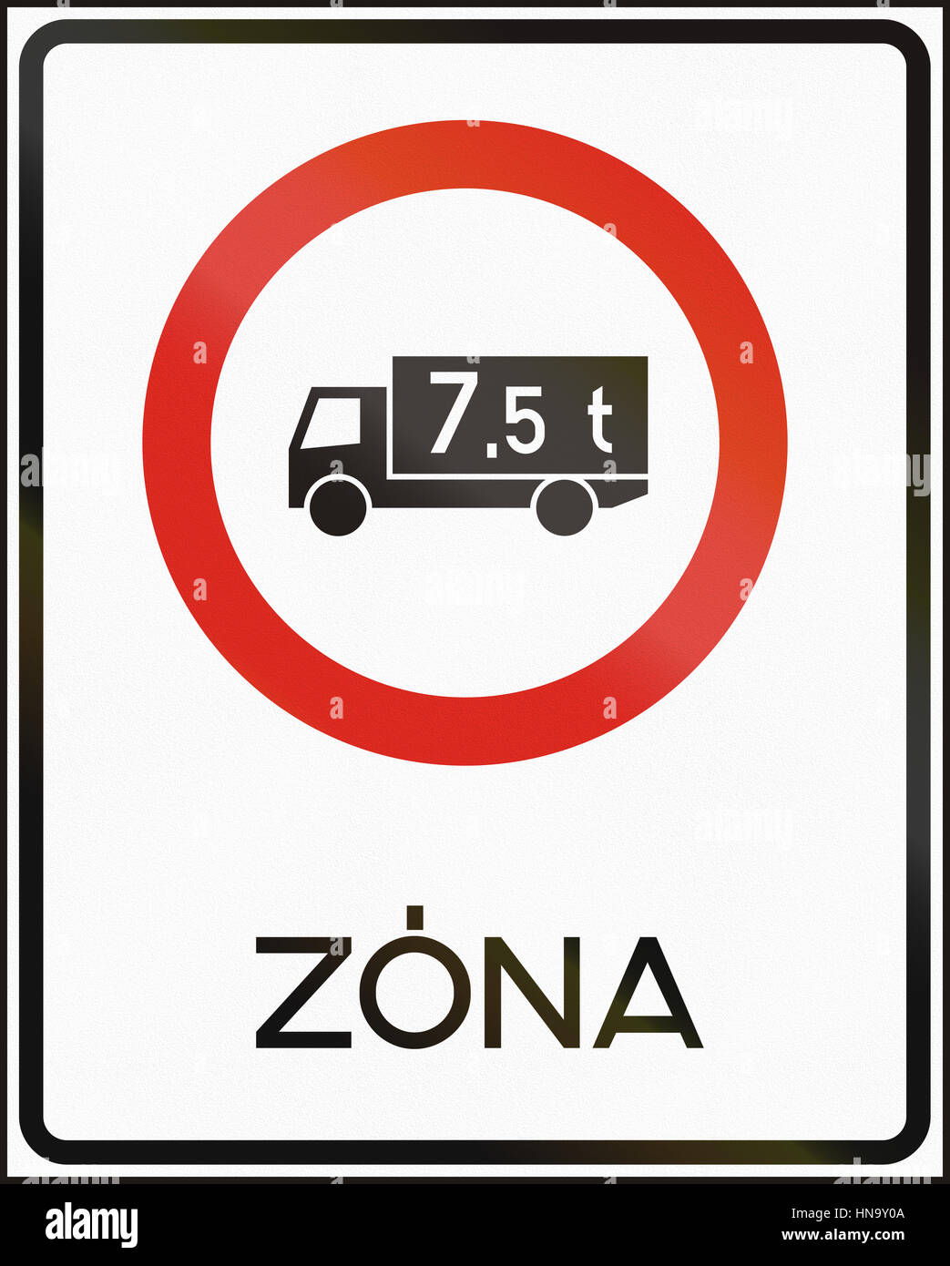 Road sign used in Hungary - No lorries weighing more than 7,5 tons - zone. Stock Photo