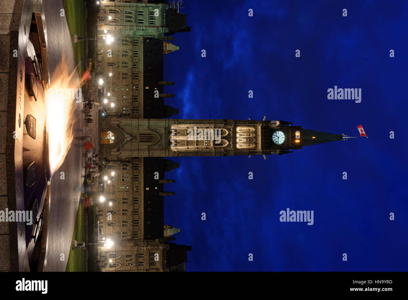 Parliament with symbolic flame, Centennial Flame, Parliament Hill, night scene, Ottawa, Ontario Province, Canada Stock Photo