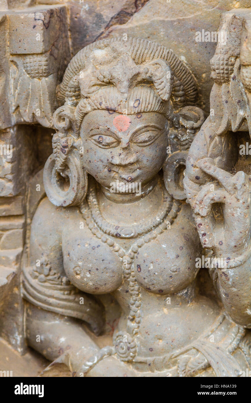 A carving of an Apsara (heavenly nymph) at the Chand Baori stepwell in Abhaneri, Rajasthan, India. Stock Photo