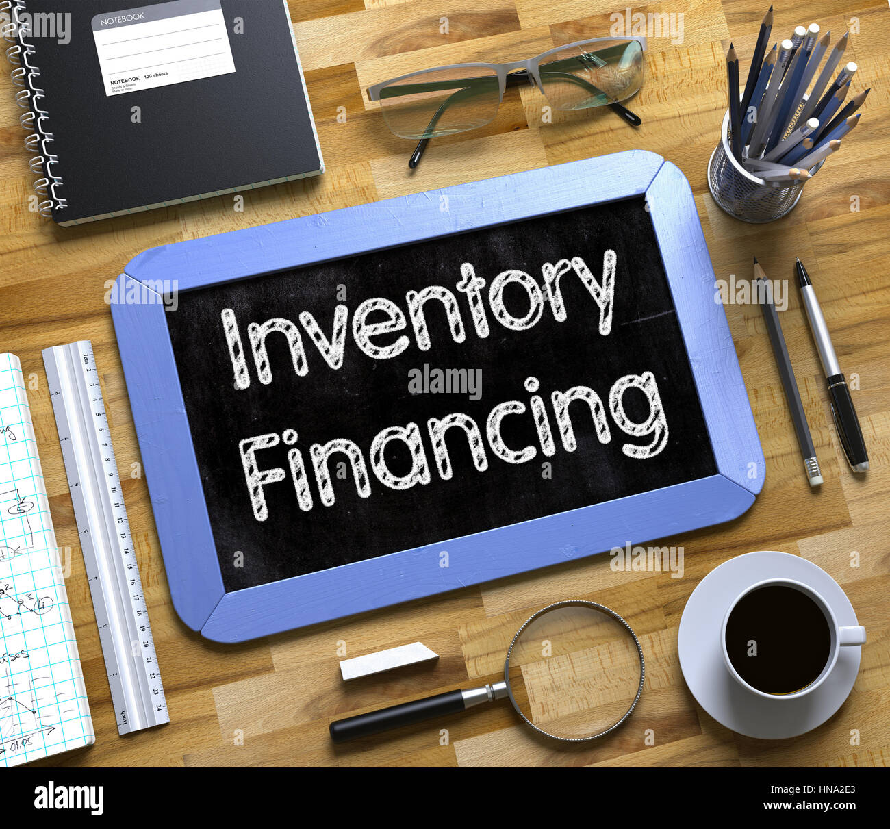 Inventory Financing Handwritten on Small Chalkboard. 3D. Stock Photo