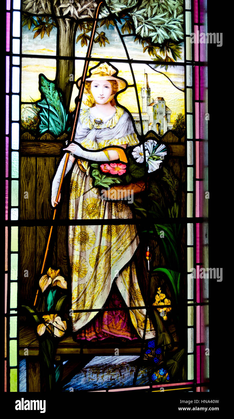 Stained glass window of a woman, from 1880, as seen at Rodman Hall Arts