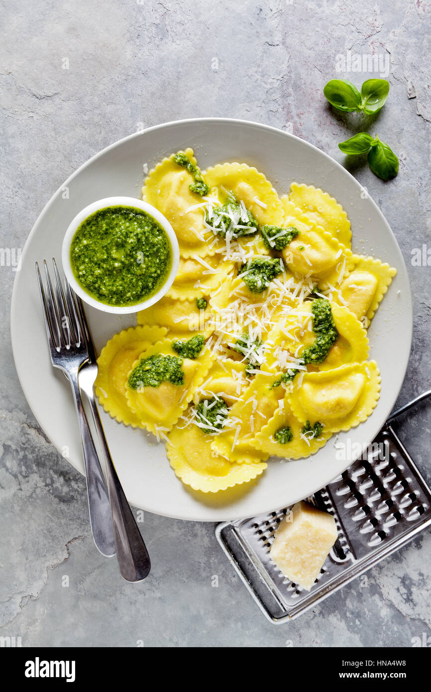 delicious cooked Ravioli in a gray plate on a gray stone background ...