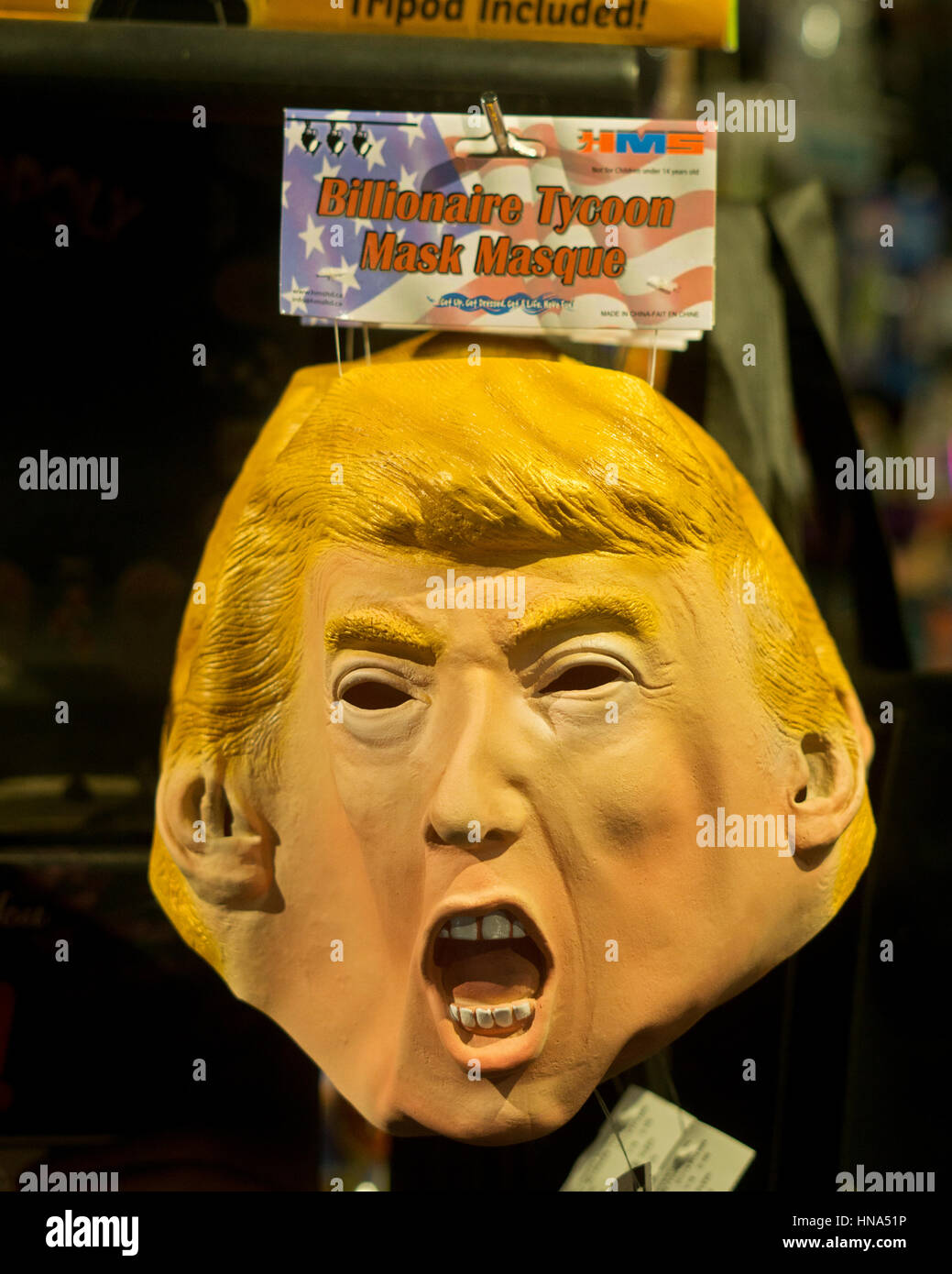 A Donald Trump Billionaire Tycoon mask for sale at the Halloween Adventure in Greenwich Village, Manhattan, New York City. Stock Photo