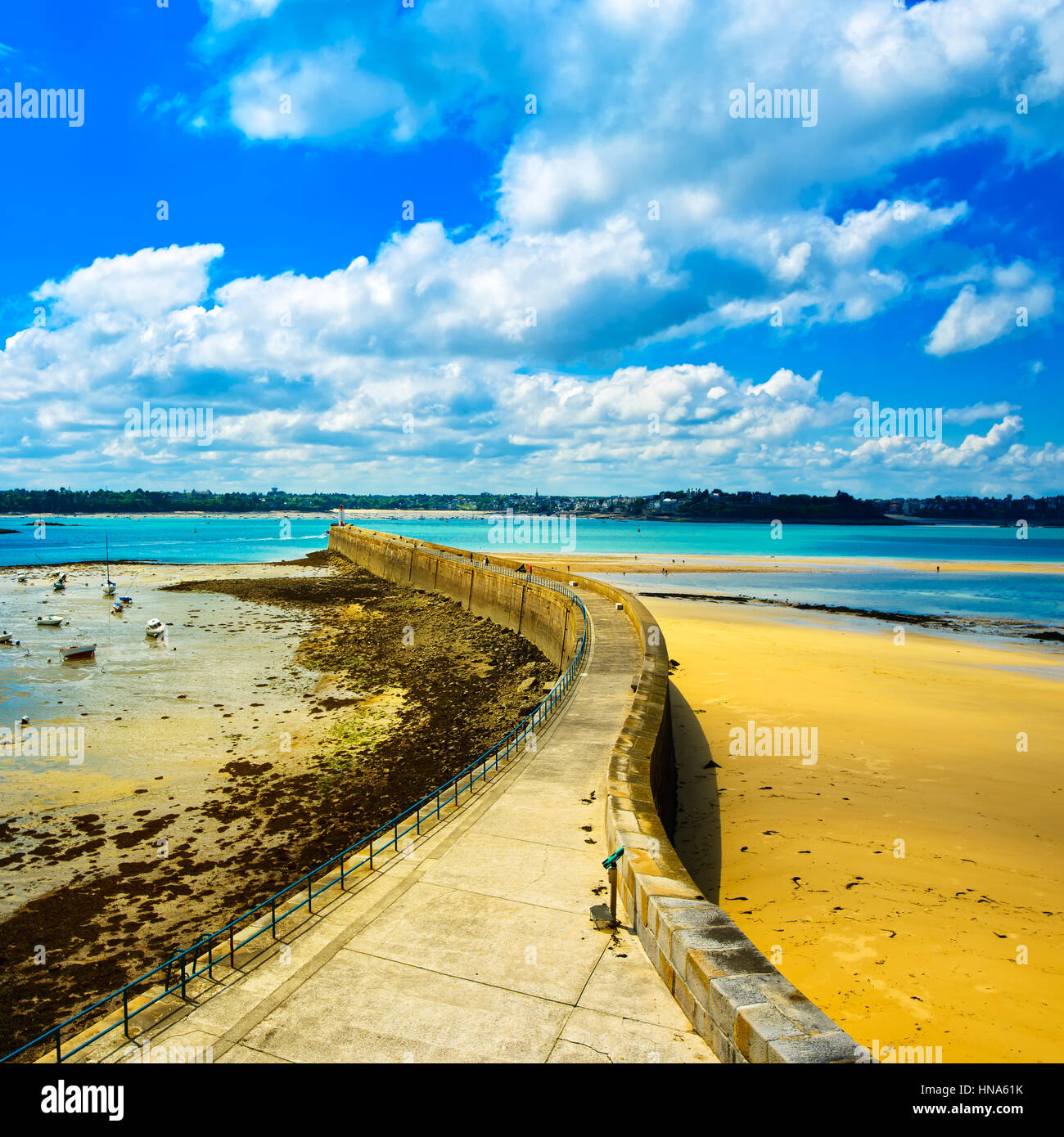 Saint Malo pier or jetty and lighthouse during Low Tide. Brittany, France, Europe. Stock Photo