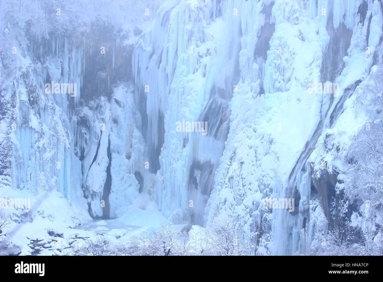 Plitvice lakes, World famous National park in Croatia, UNESCO world heritage, frozen waterfalls, cold winter scene Stock Photo