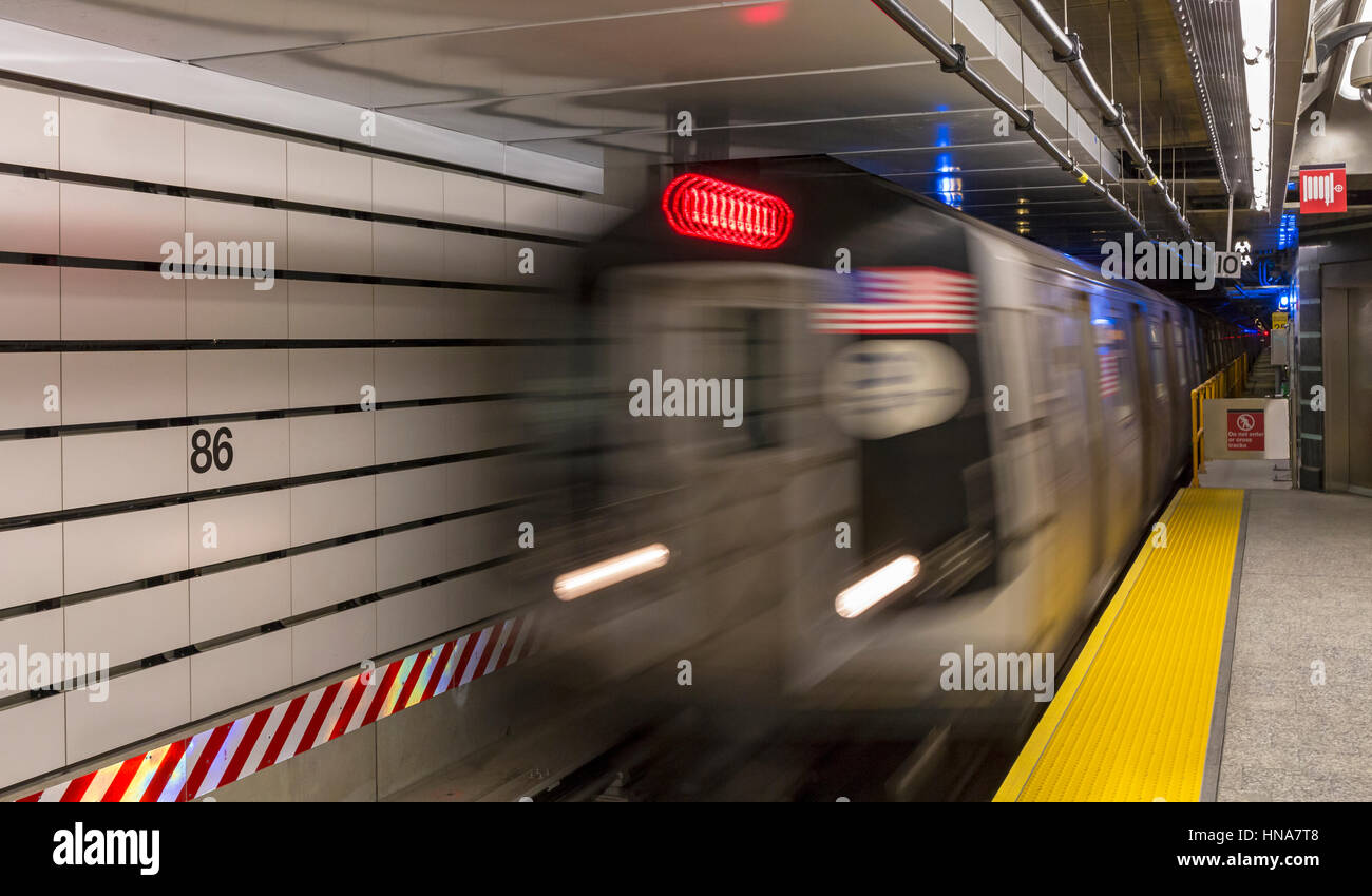 February 5, 2017: A train arriving at the new 86th Street Q Train platform on the Second Avenue Subway line, New York. Stock Photo