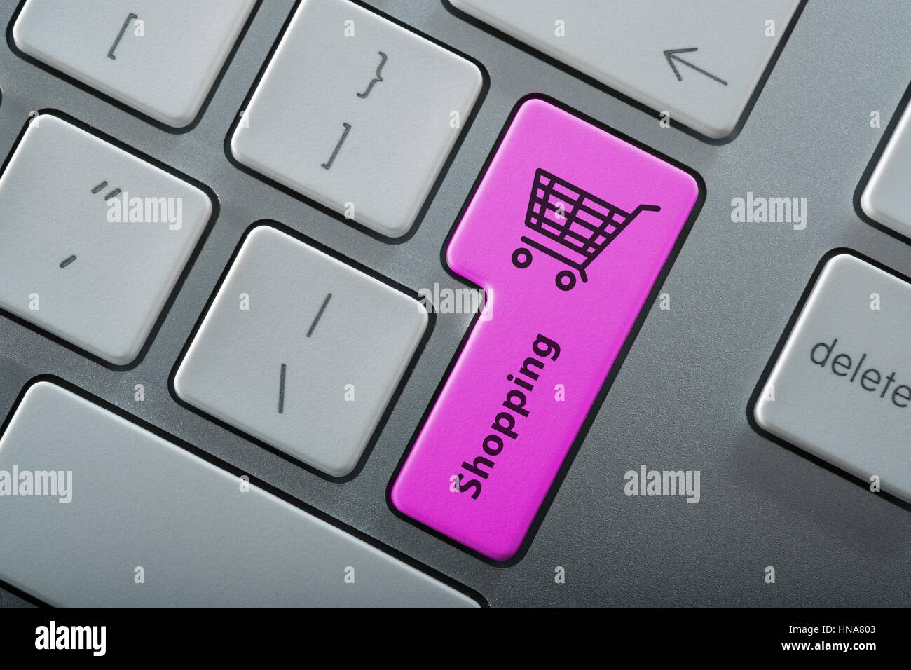 Online shopping - computer keyboard with Shopping Cart symbol Stock Photo
