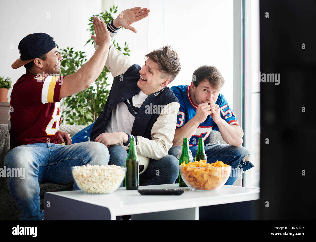 Men cheering hi-res stock photography and images - Alamy