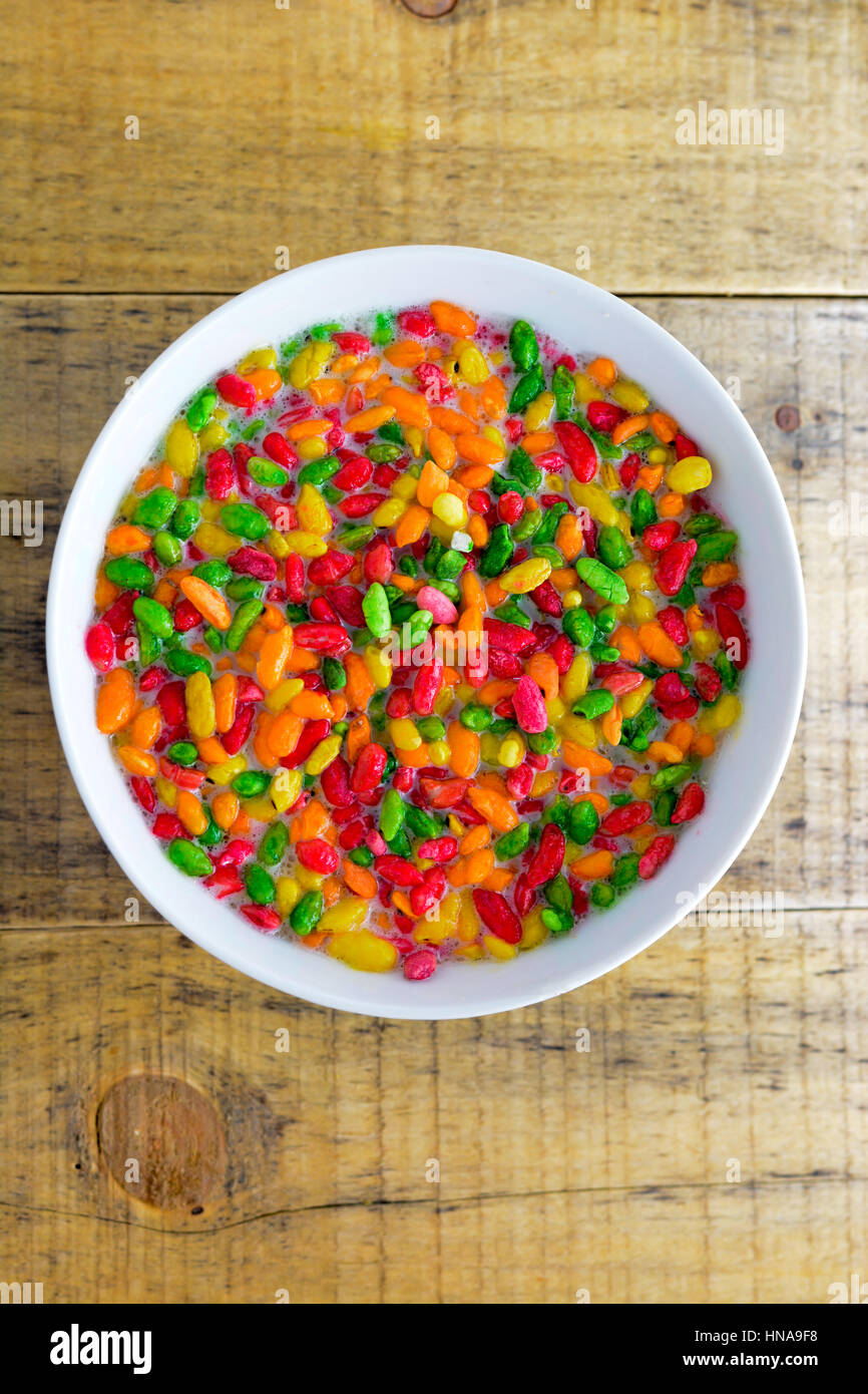 Prepared breakfast with milk and colorful puffed rice Stock Photo