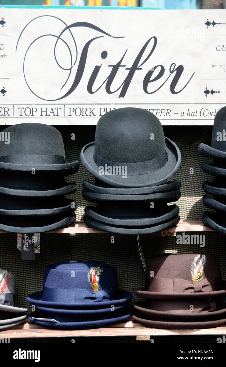 Smart hats on market stall, London, UK. Stock Photo