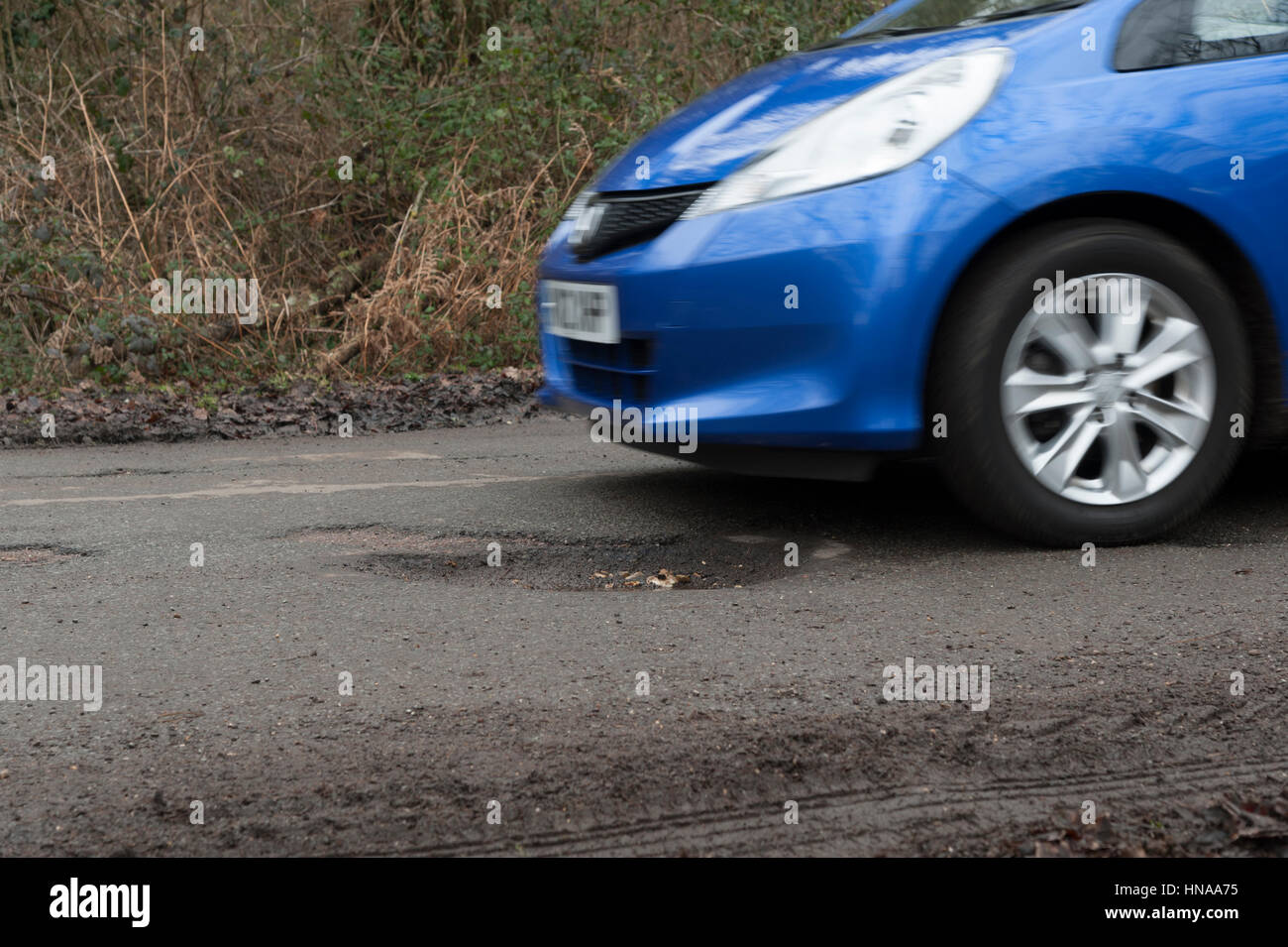 Pothole in Road surface Stock Photo Alamy