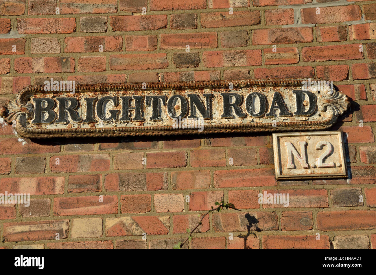 Old rusted Brighton Road street sign, Finchley N2, London, UK. Stock Photo