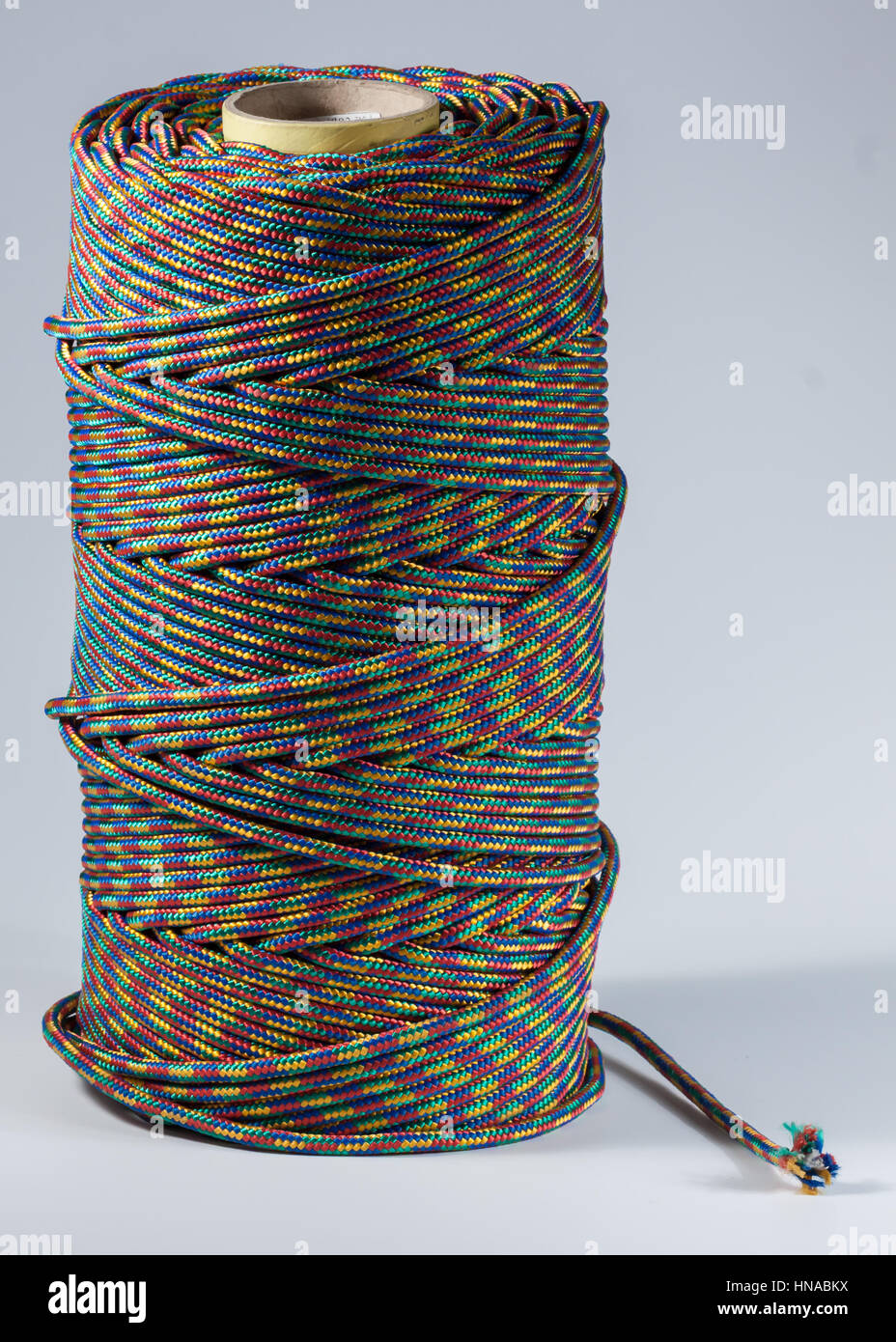 coil of rope on white background colored rope Stock Photo