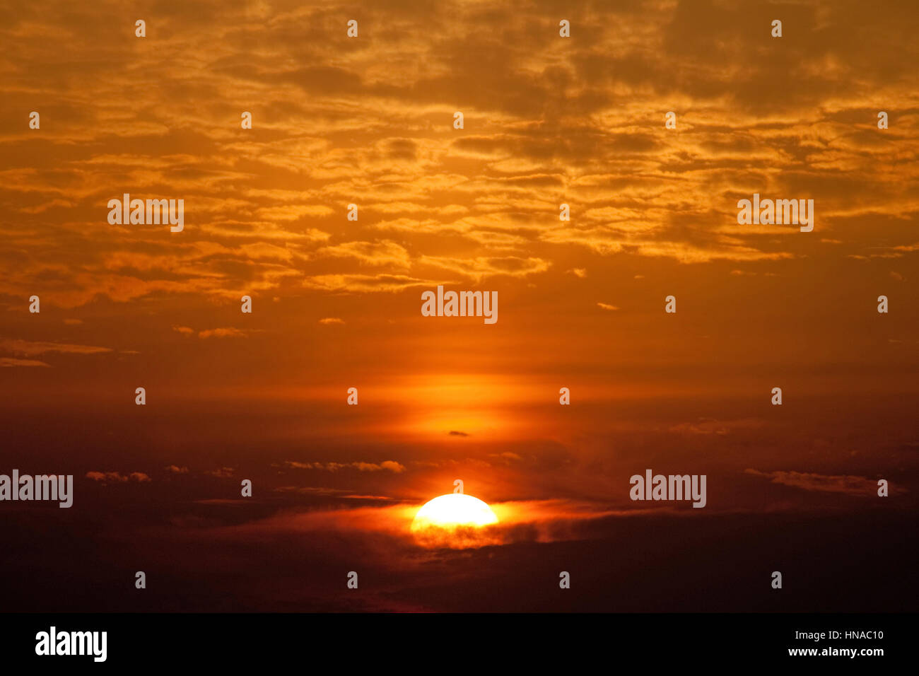 Warm red orange clouds hi-res stock photography and images - Alamy
