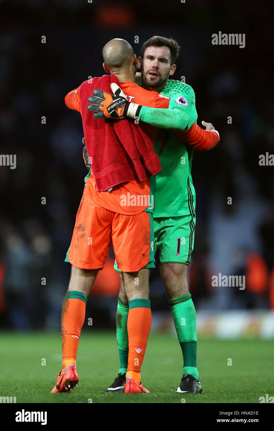 West Bromwich Albion goalkeeper Ben Foster (right) and Stoke City goalkeeper Lee Grant embrace at the final whistle Stock Photo