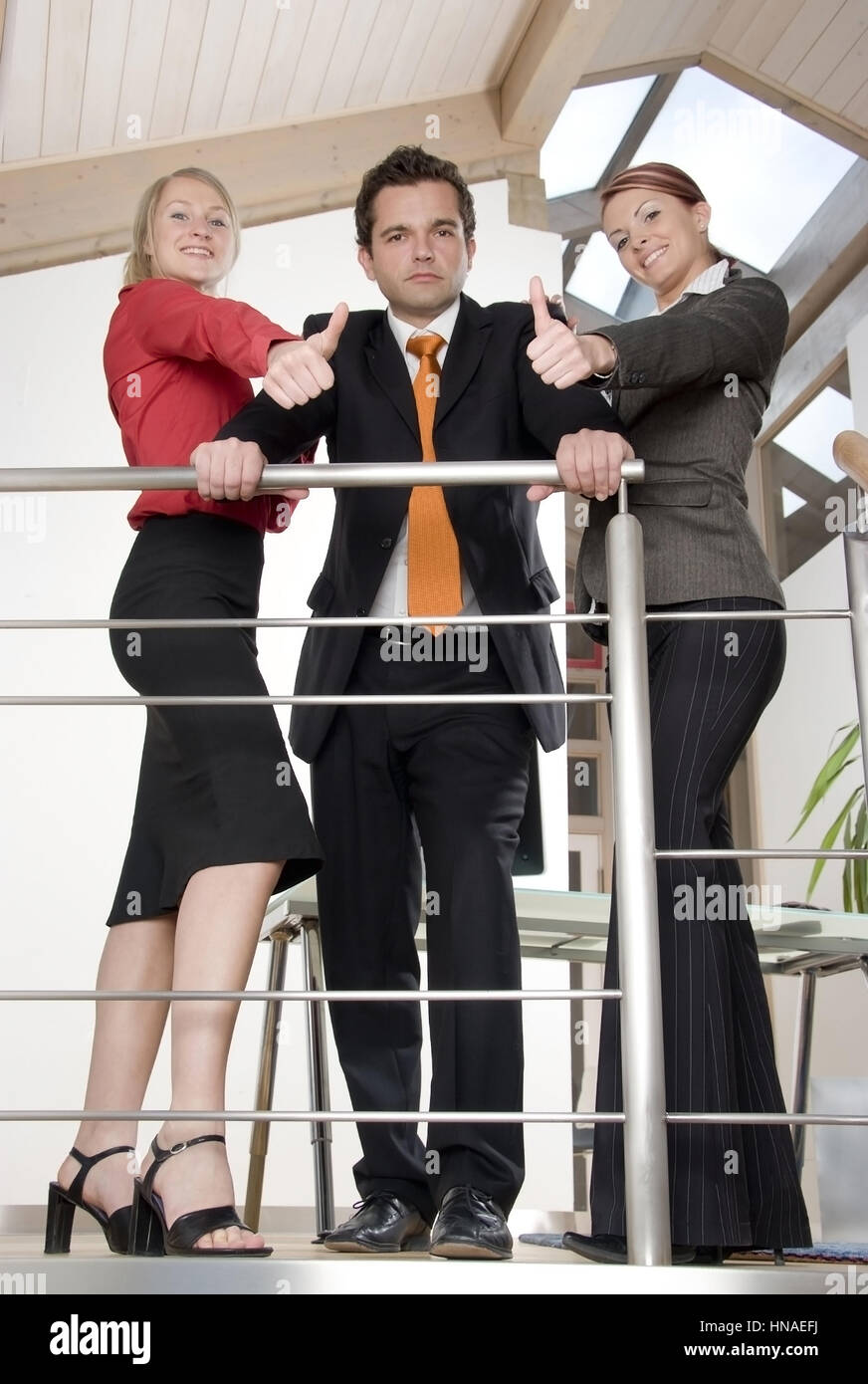 Drei junge Geschaeftsleute - three young business people Stock Photo