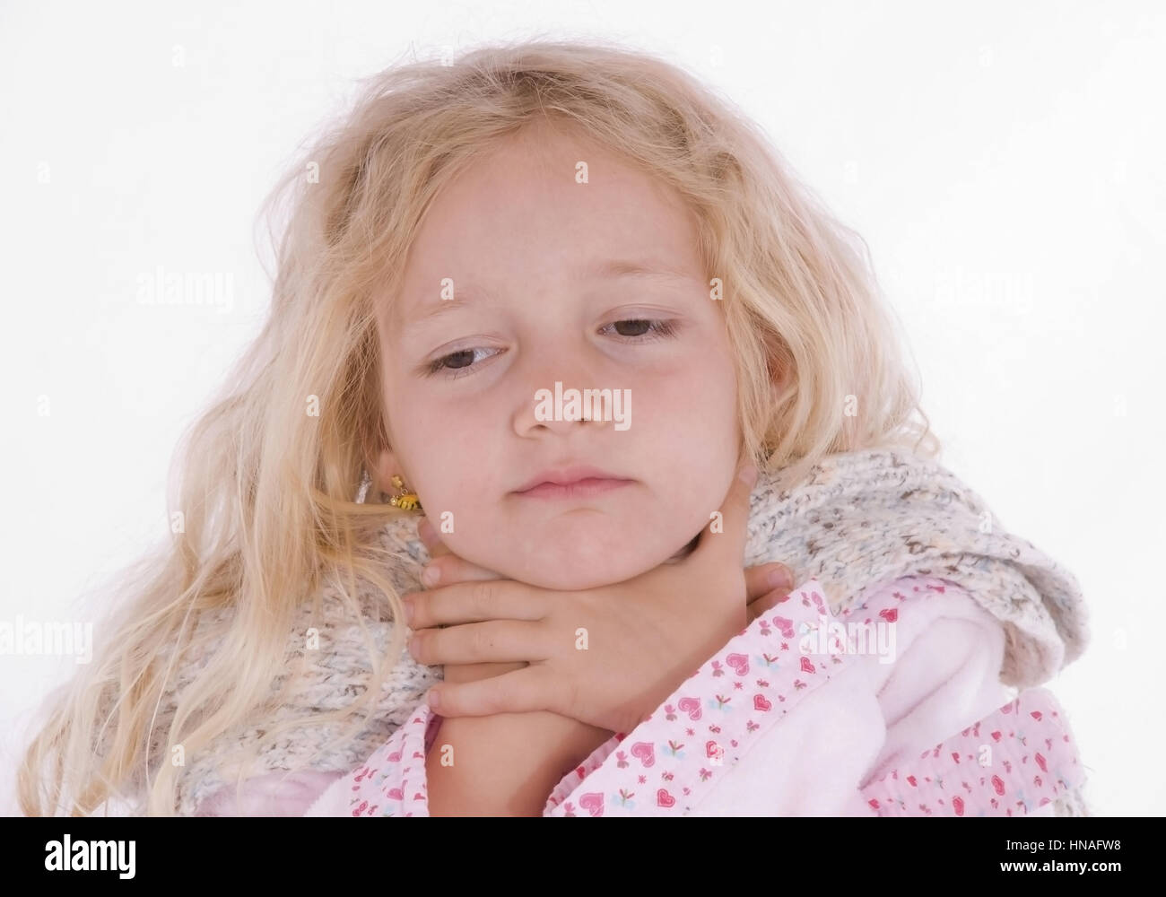 Krankes Maedchen, 6 Jahre, mit Halsschmerzen - sick girl with sore throat Stock Photo