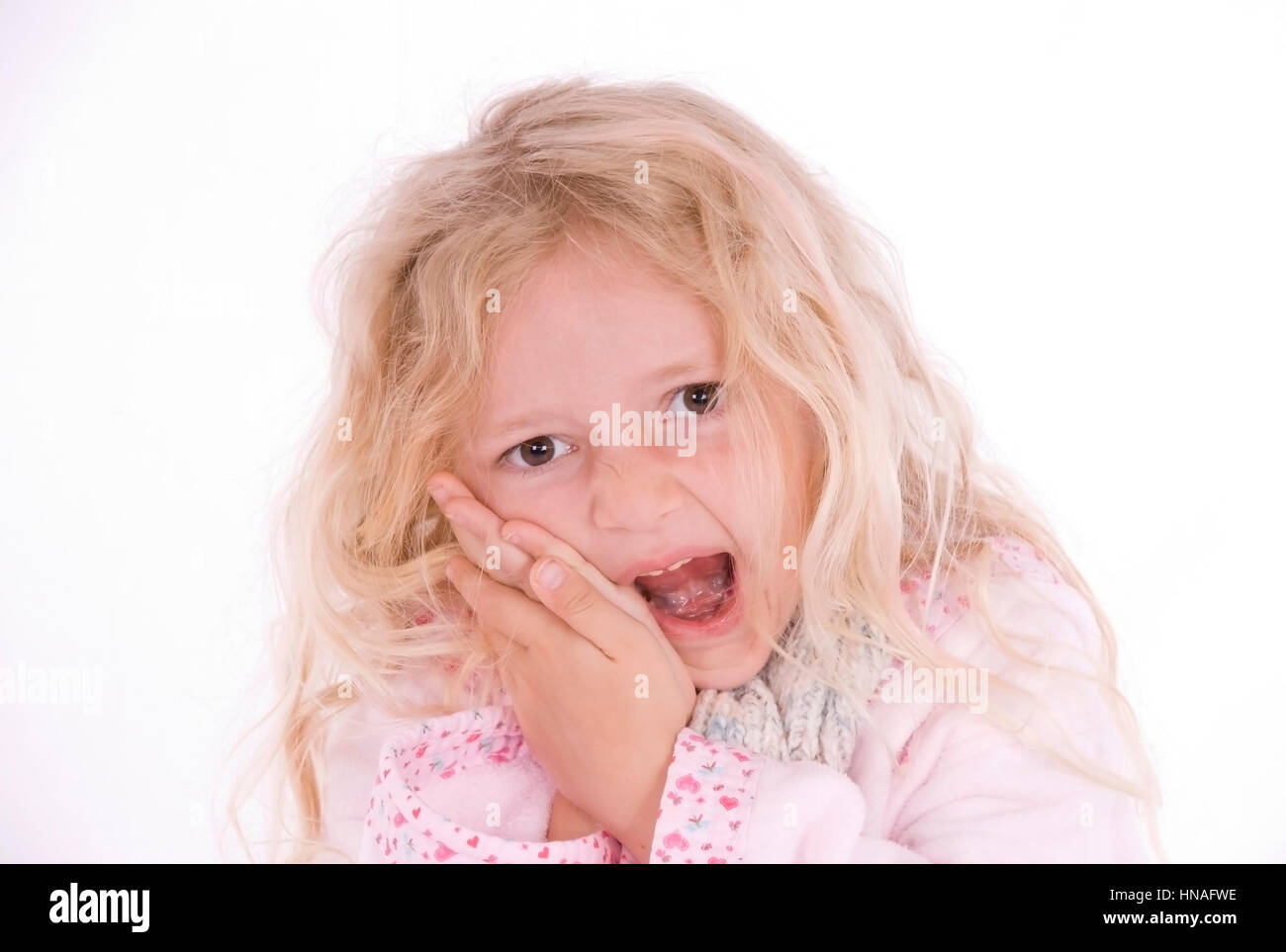 Maedchen, 6 Jahre, mit Zahnschmerzen - girl with toothache Stock Photo