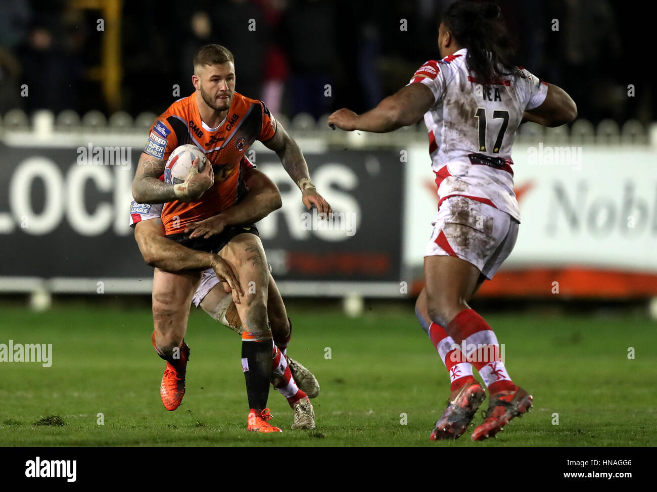 Castleford Tigers' Zak Hardaker tries to break free from the Leigh Centurions' defence during the Super League match at the Mend-A-Hose Jungle, Castleford. Stock Photo