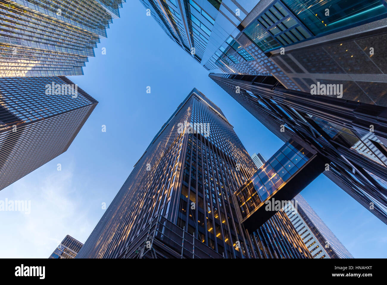 Office buildings stretch up to the blue sky in the financial district in downtown Toronto Ontario Canada. Stock Photo