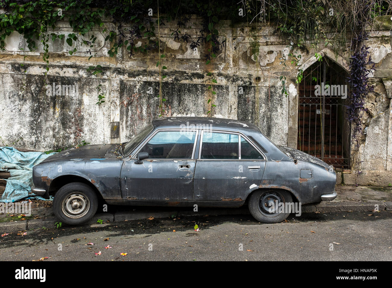 Abandoned car in Santa Tereza neighbourhood in Rio de Janeiro Stock Photo