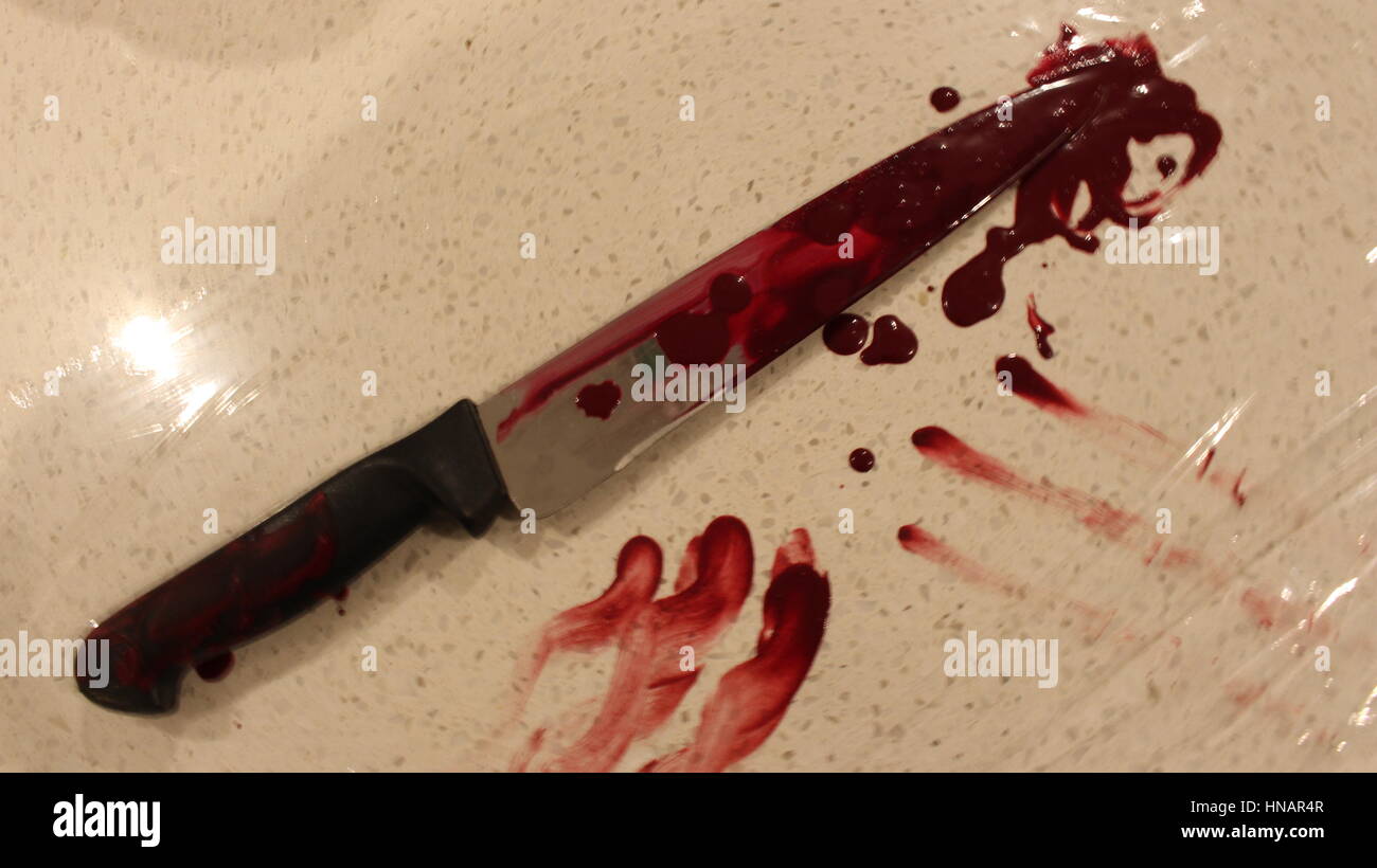 A bloodied kitchen knife Stock Photo