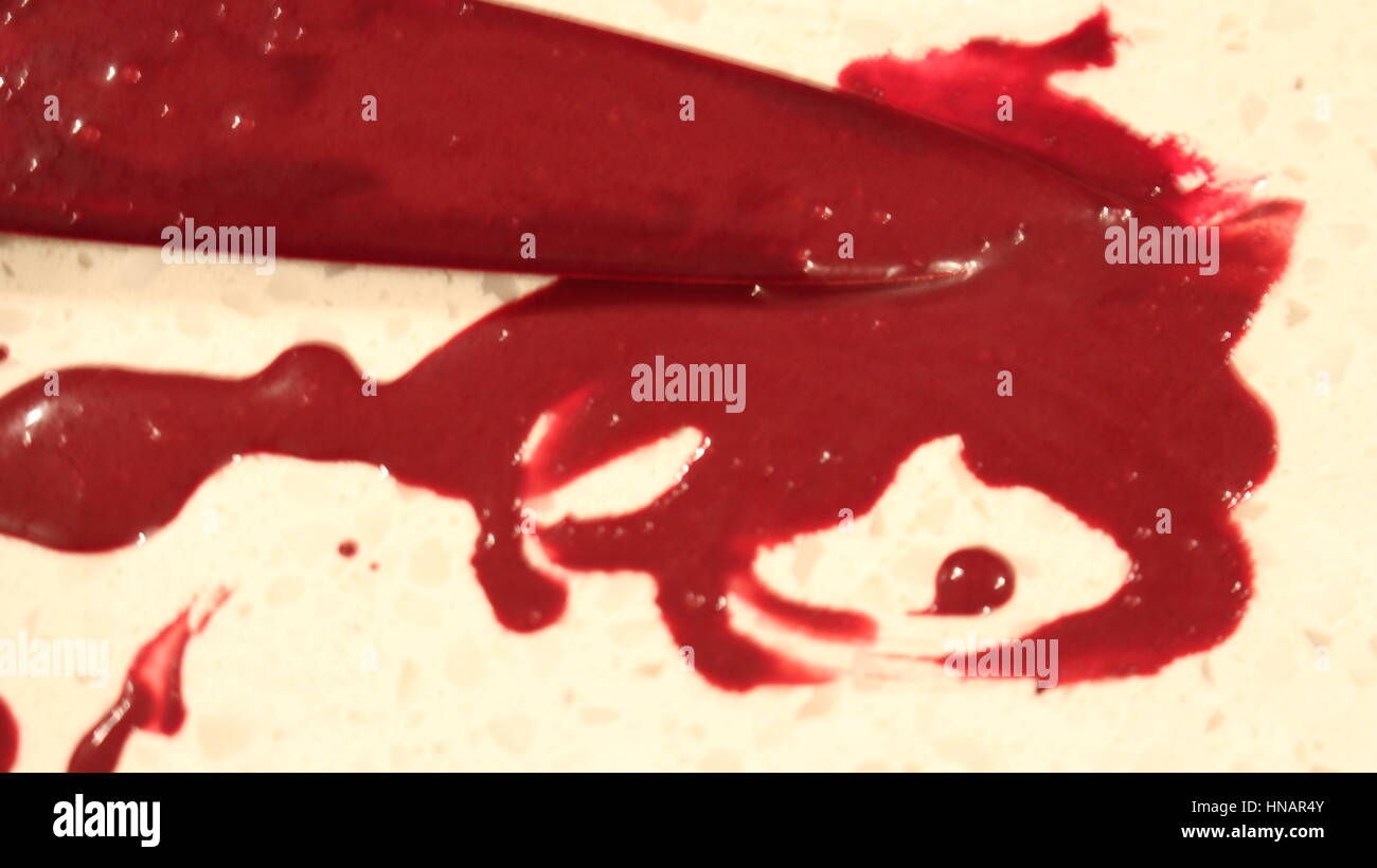 A bloodied kitchen knife Stock Photo
