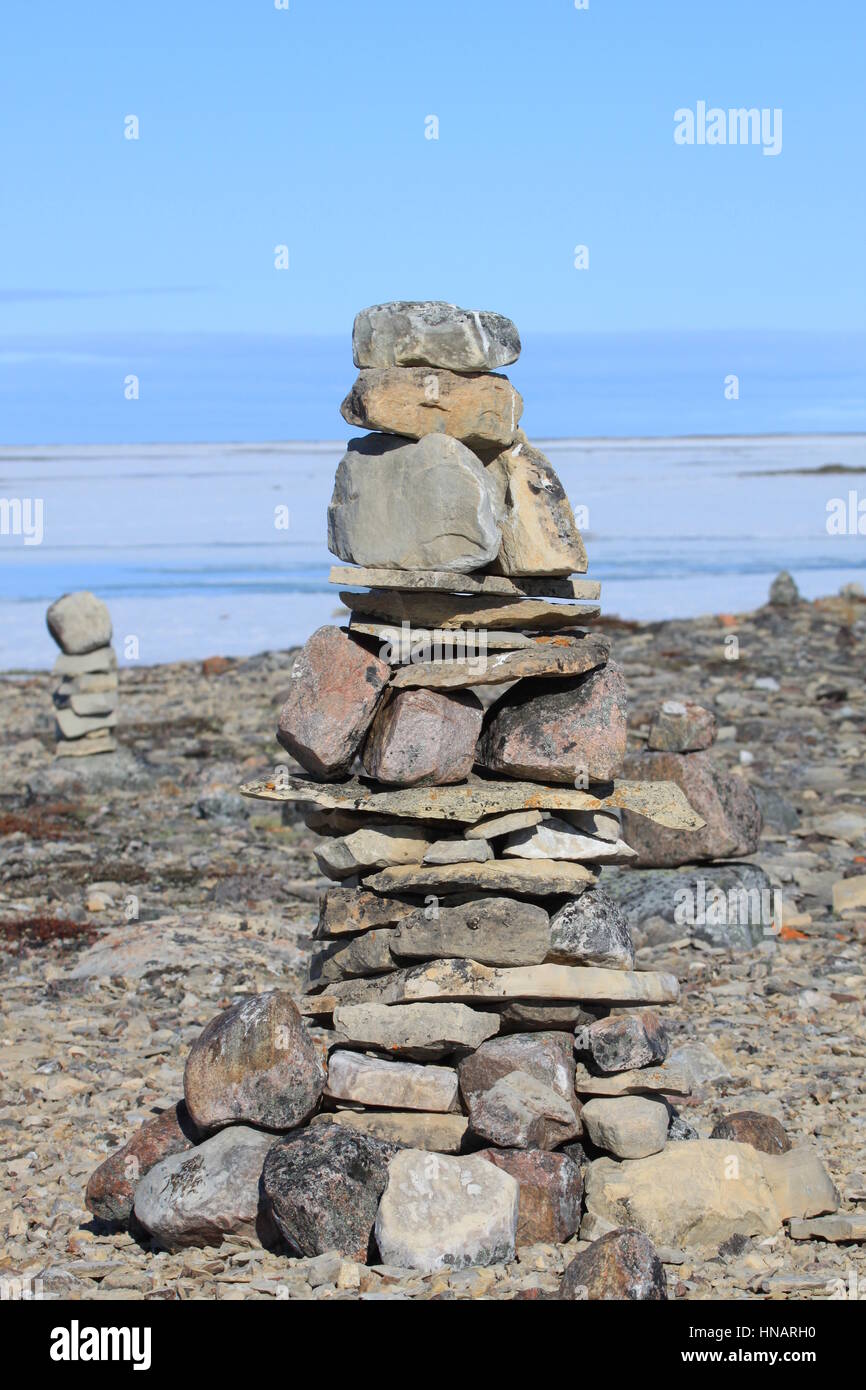 Single Inukshuk or Inuksuk near the community of Igloolik, Nunavut