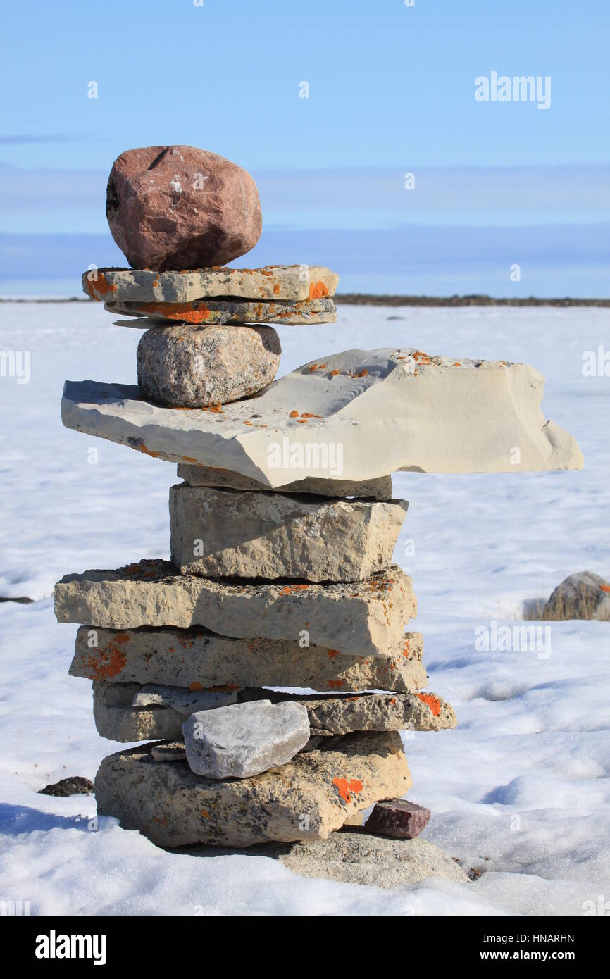 A single Inukshuk or Inuksuk near the community of Igloolik, Nunavut