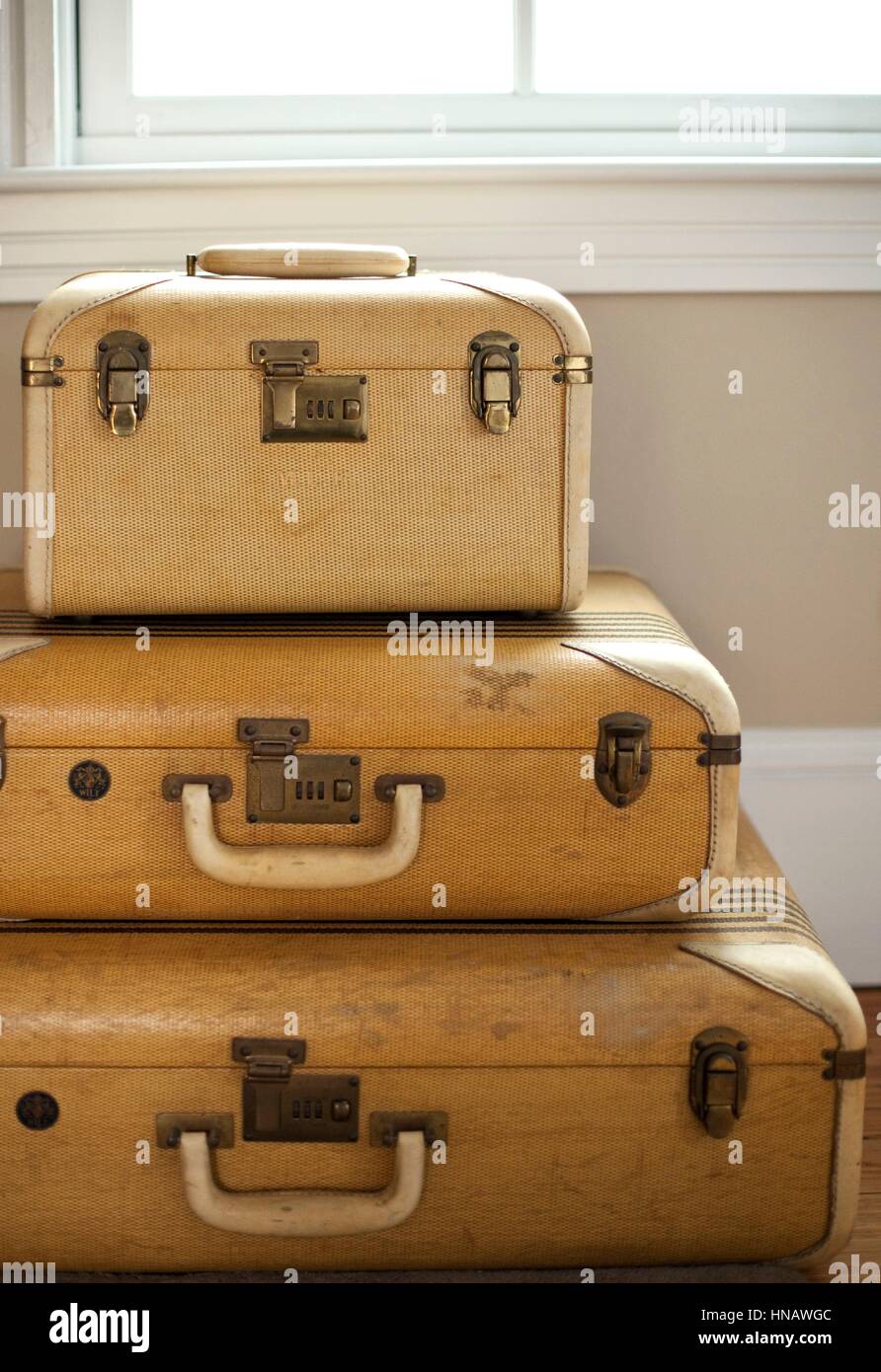 Old Shabby Vintage Suitcase Isolated on White Background. Retro