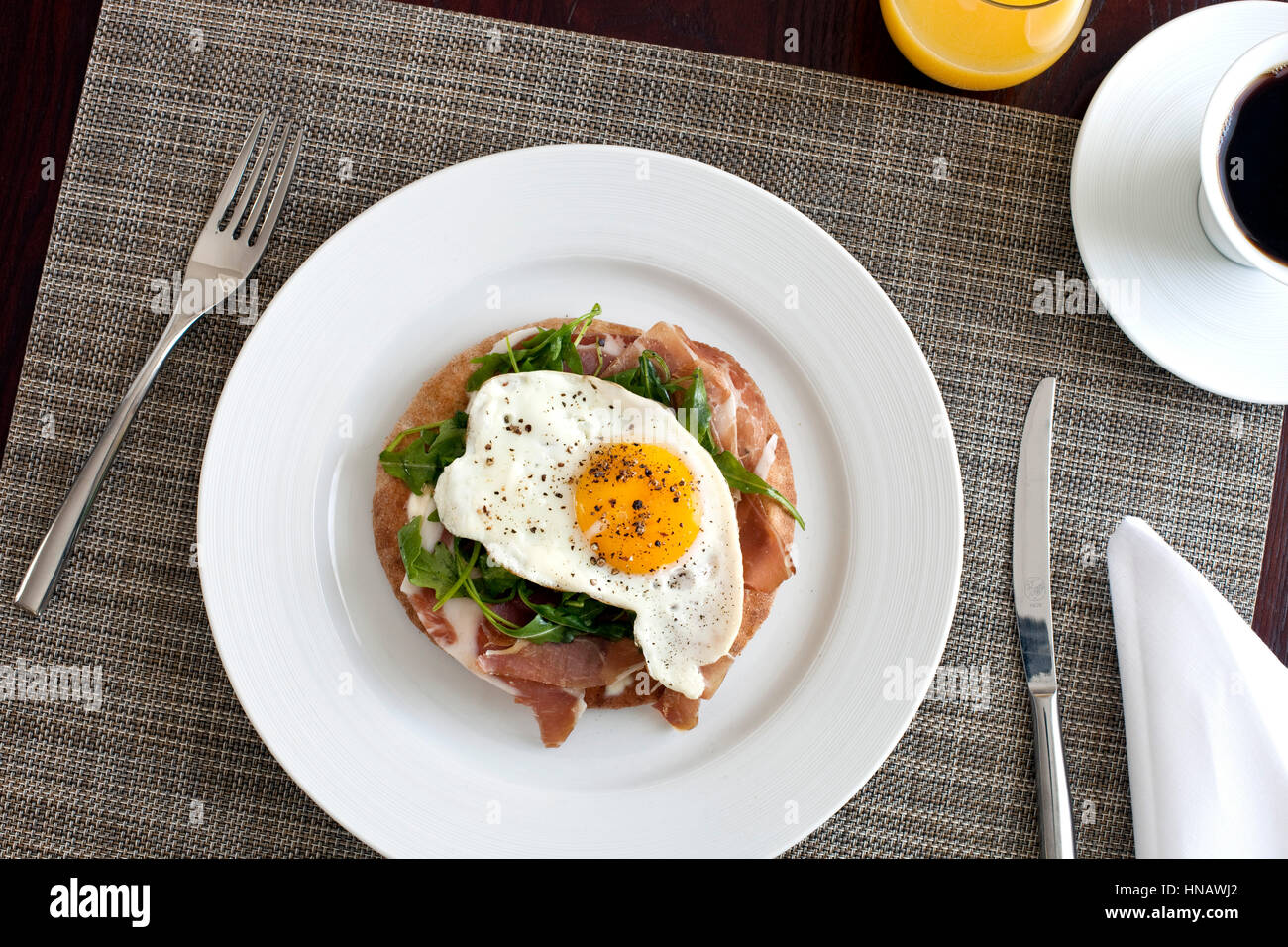 Open faced fried egg sandwich on white plate, Kennebunkport, ME. Stock Photo