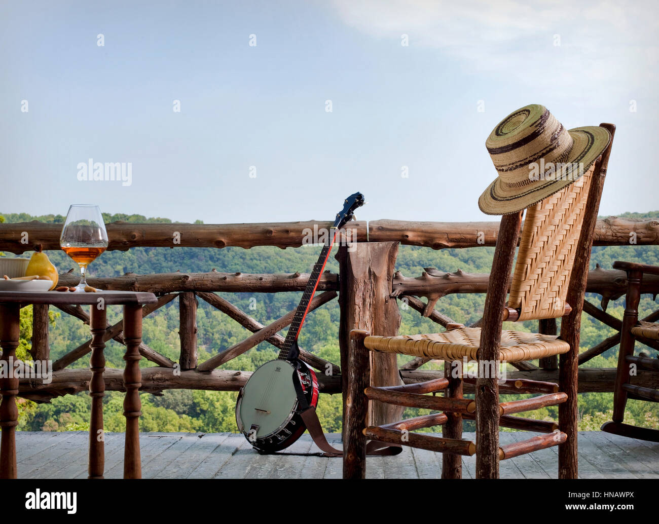 Country deck with banjo and hat, Laurel Lodge, Harper's Ferry, WV. Stock Photo