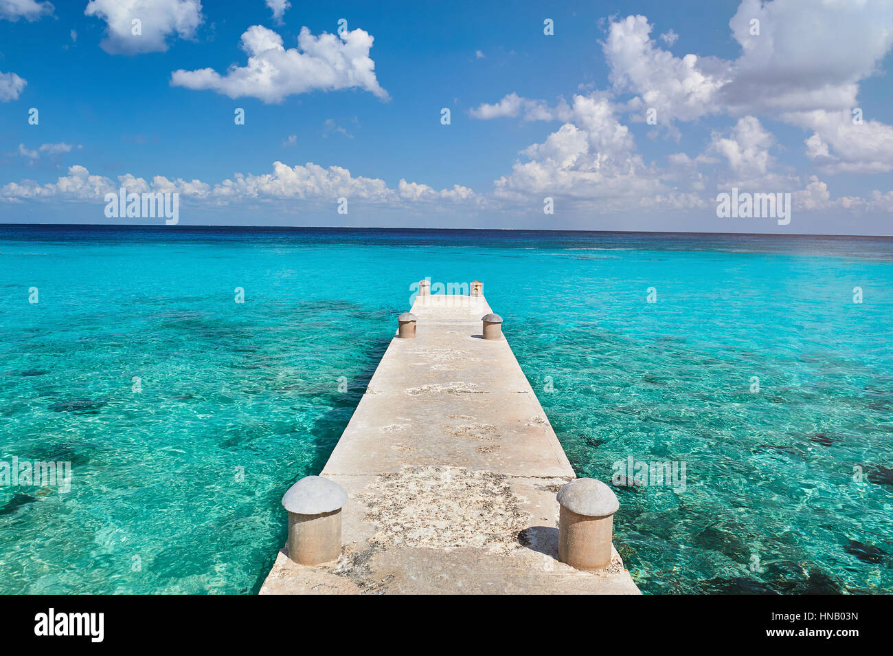 pier in paradise caribbean sea with blue water Stock Photo