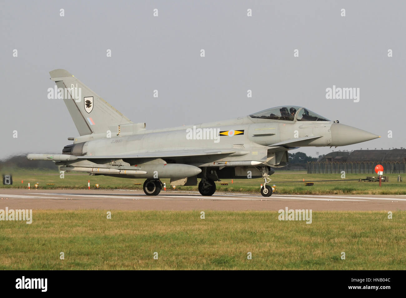 Royal Air Force Typhoon landing after a Quick Reaction Alert (QRA) practise scramble. As usual, the aircraft was loaded with live rounds. Stock Photo