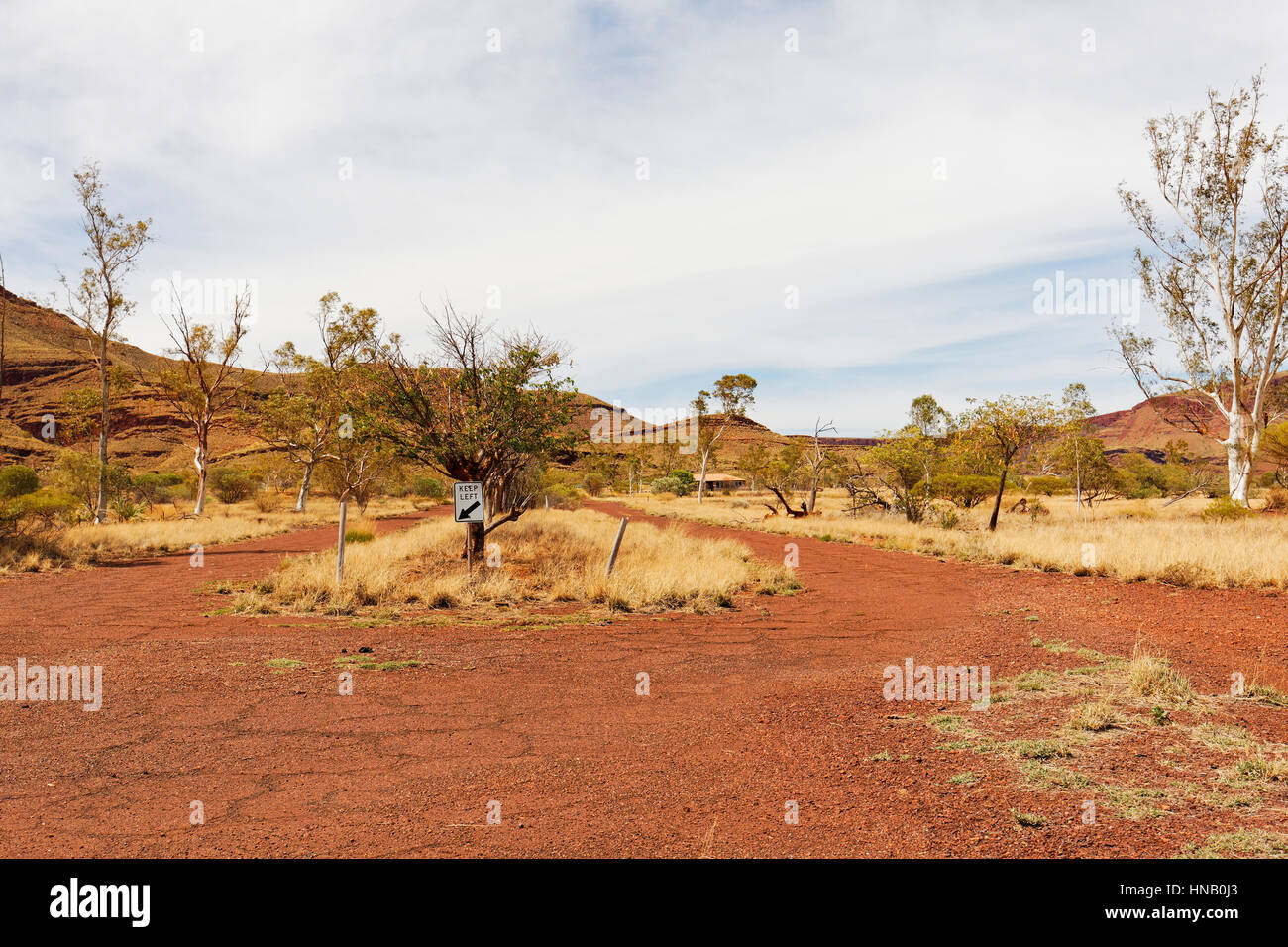 Keep left road sign in bandoned asbestos mining town, Witenoom, Pilbara, Western Australia. Stock Photo