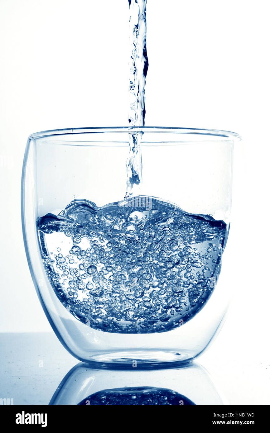 glass of water /Water is a polar inorganic compound that is at room  temperature a tasteless and odorless liquid, nearly colorless with a hint  of blue Stock Photo - Alamy