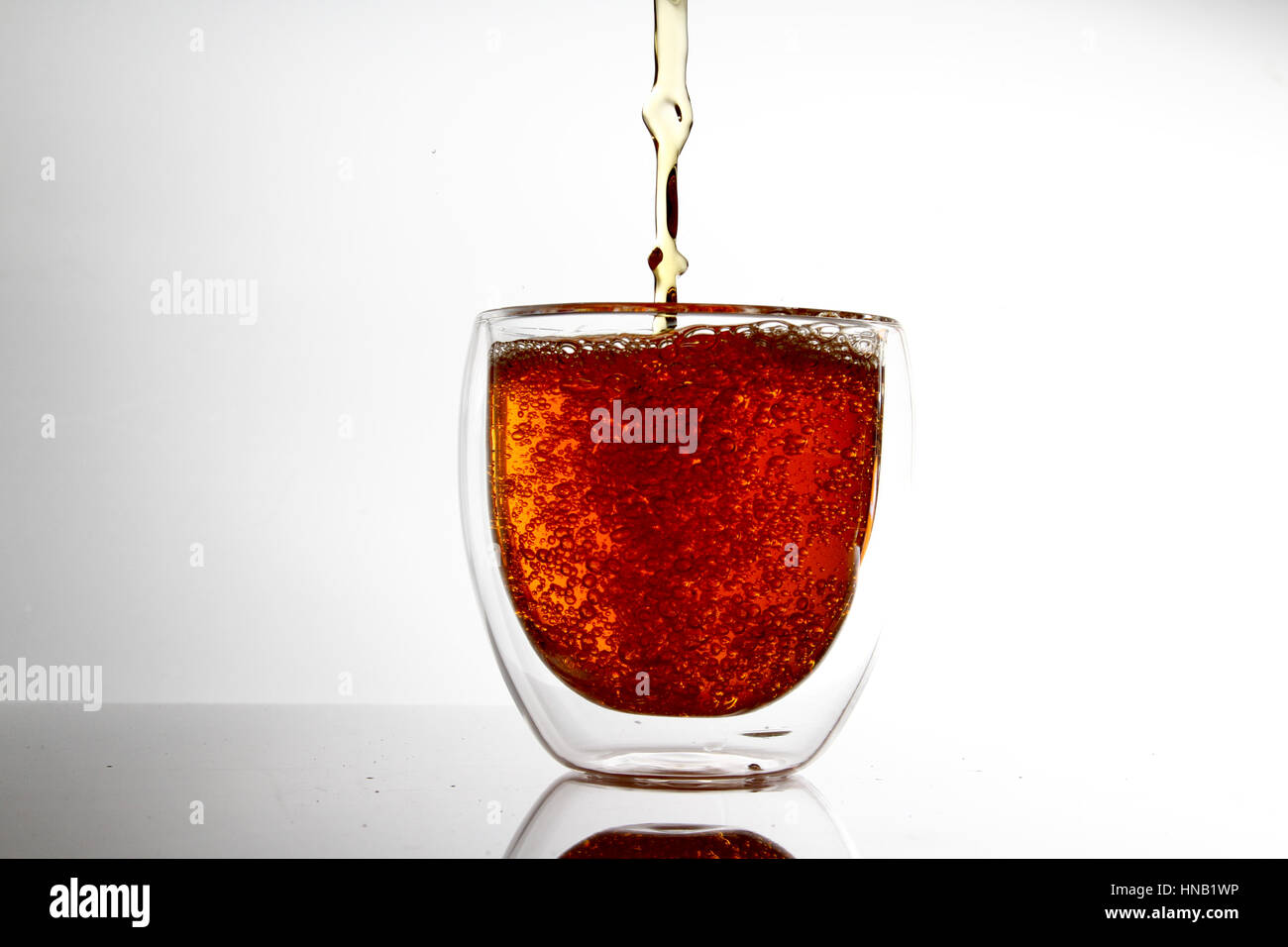 water in transparent glass / A drink or beverage is a liquid intended for human consumption. Stock Photo
