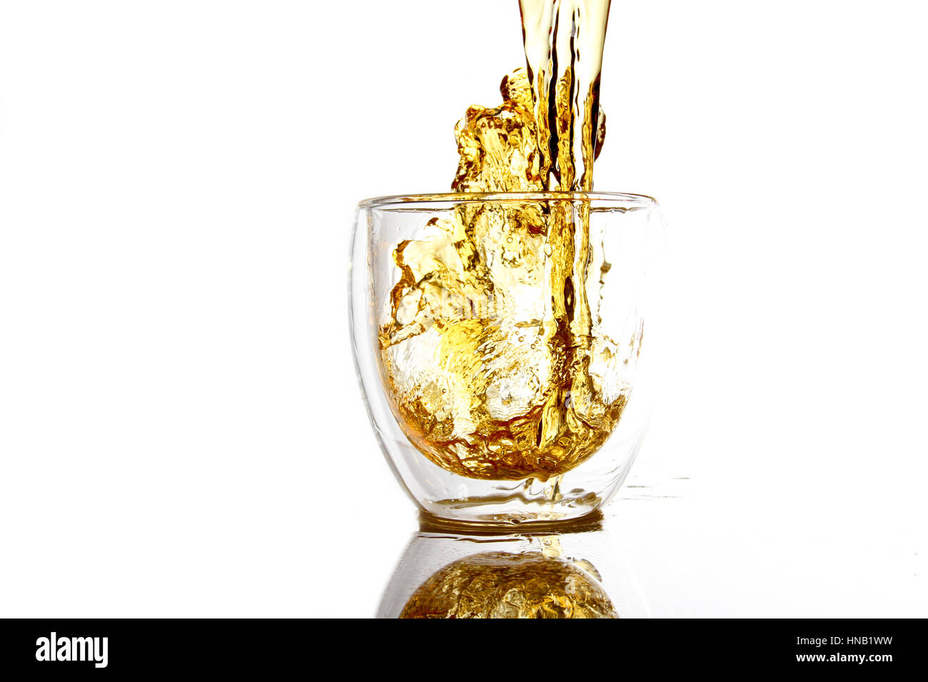 water in transparent glass / A drink or beverage is a liquid intended for human consumption. Stock Photo