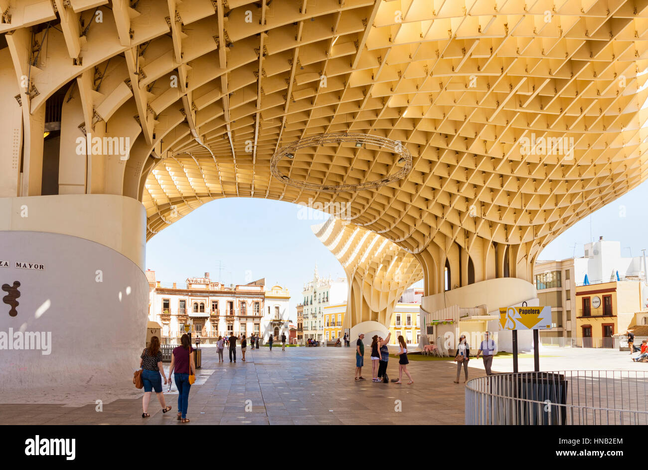Seville, Spain - May 1, 2016: People walking on Plaza Mayor, the lower level of Espace Metropol Parasol, world’s largest wooden structure Stock Photo
