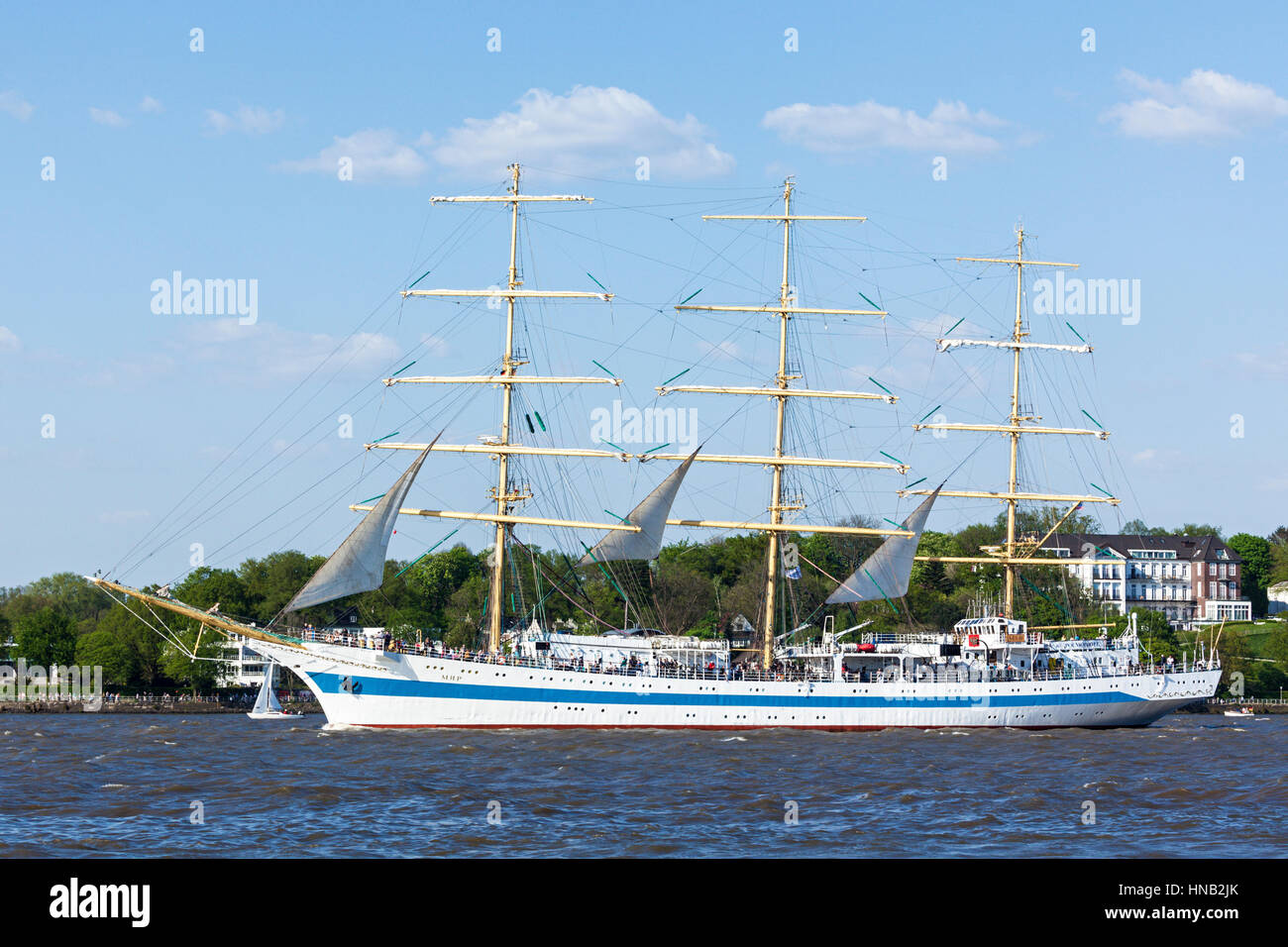 Hamburg, Germany - May 8, 2016: Russian three-masted sailing ship MIR on the Elbe river during the departure parade of 827th Hamburg Port Anniversary Stock Photo