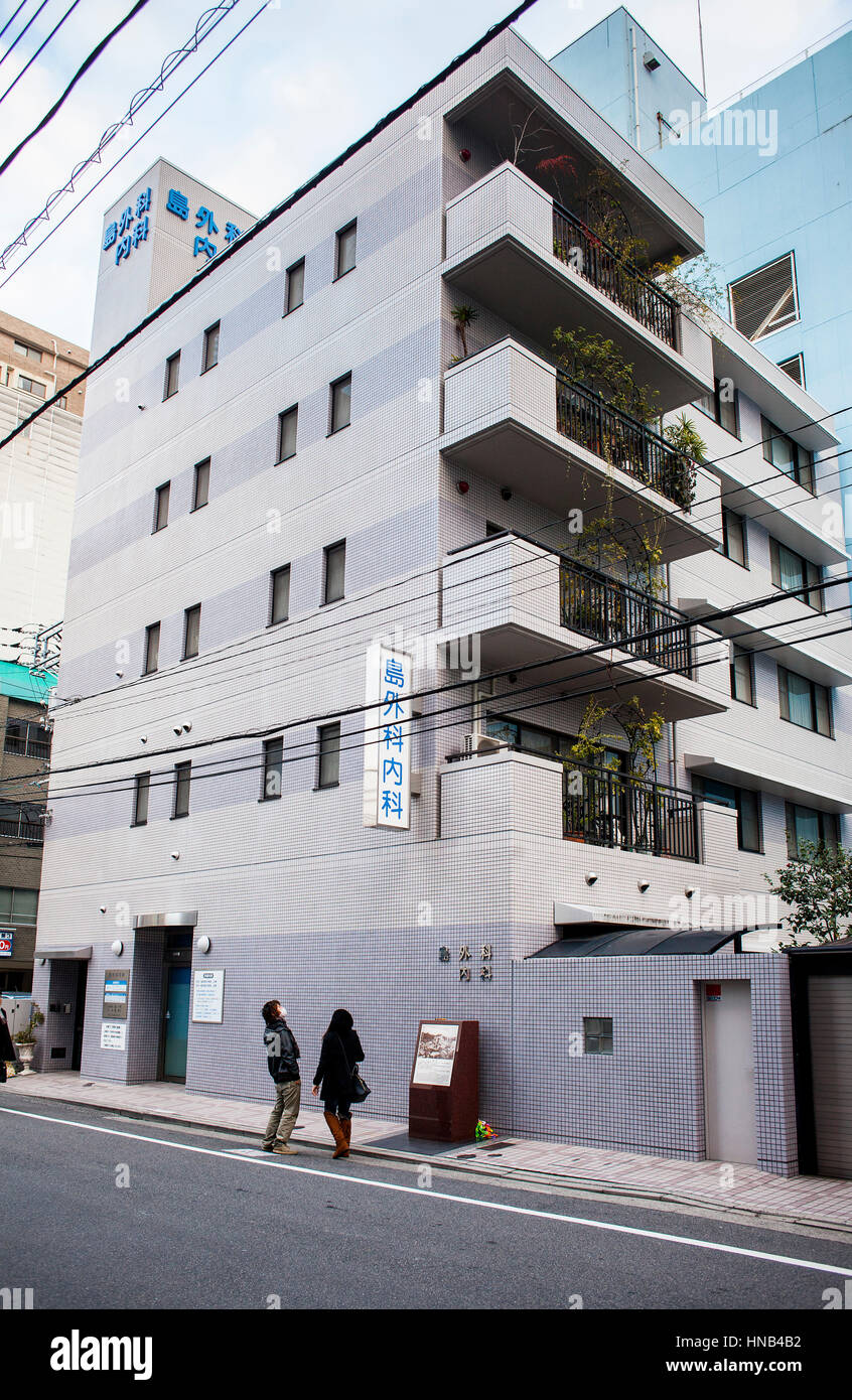 Facade of Shima Hospital,There is a monolith marking the hypocenter,the first atomic bomb used in the story exploded 600 meters above this spot, Hiros Stock Photo