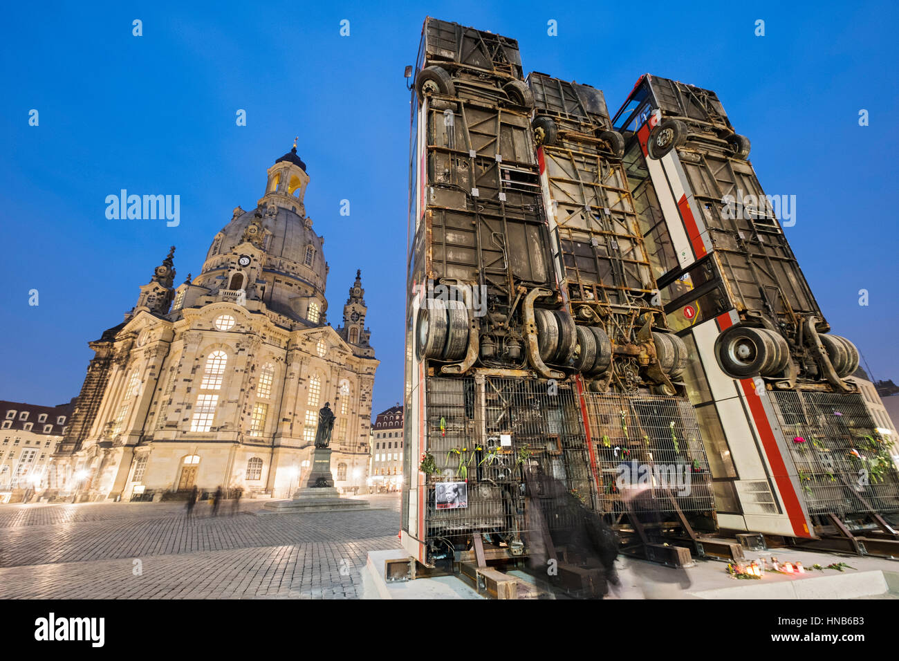 Sculpture of 3 vertical buses symbolising anti sniper barricade in Aleppo by Syrian-German artist Manaf Halbouni in Dresden, Germany. Stock Photo