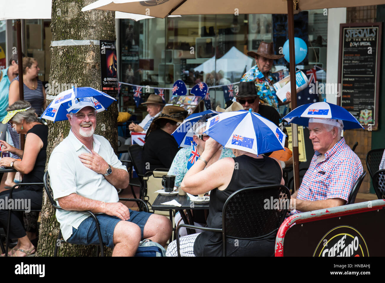 Outdoor Diners wearing sun umbrellas Australia Day 2017 at Tamworth Country Music Festival Stock Photo