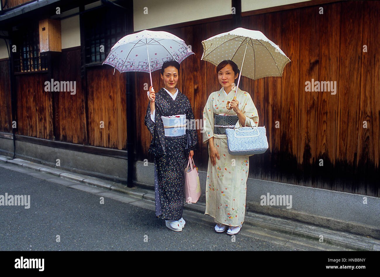 women wearing kimono in Gion quarter,Kyoto, Japan Stock Photo