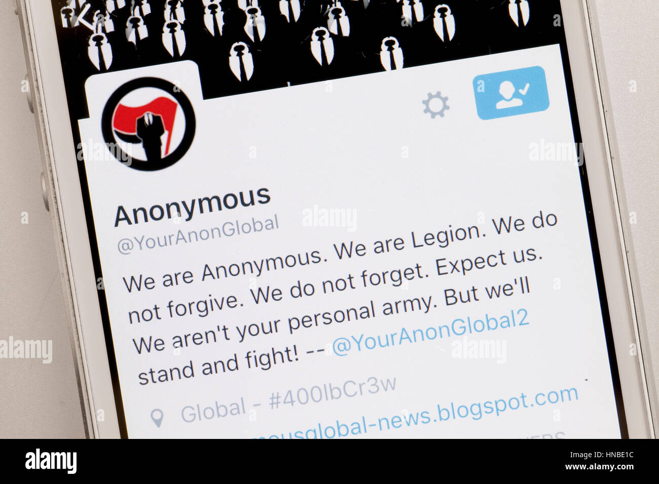 Anonymous twitter message on mobile screen - USA Stock Photo