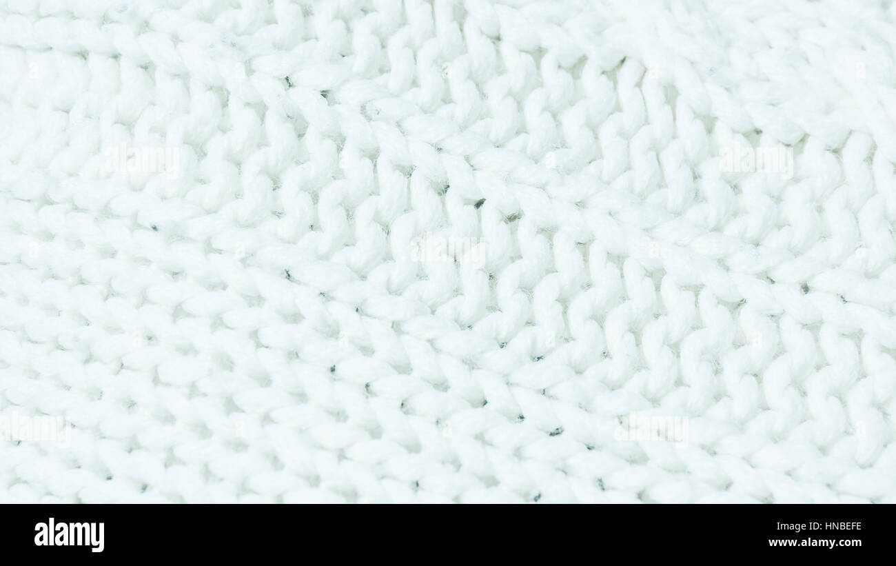 knitted fabric texture. Knitted jersey background with a relief pattern
