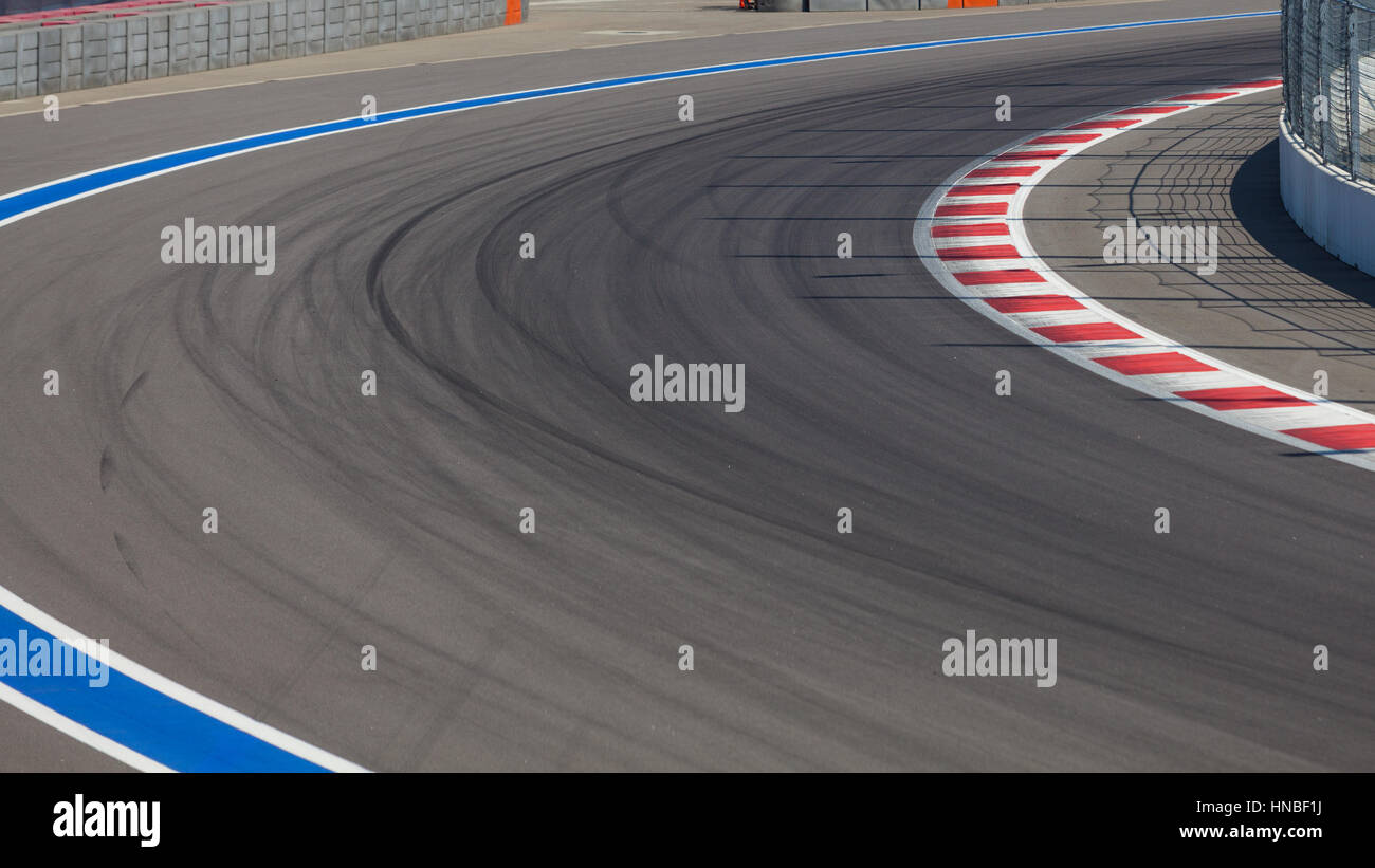 Motor racing track. Turning asphalt road with marking lines Stock Photo ...
