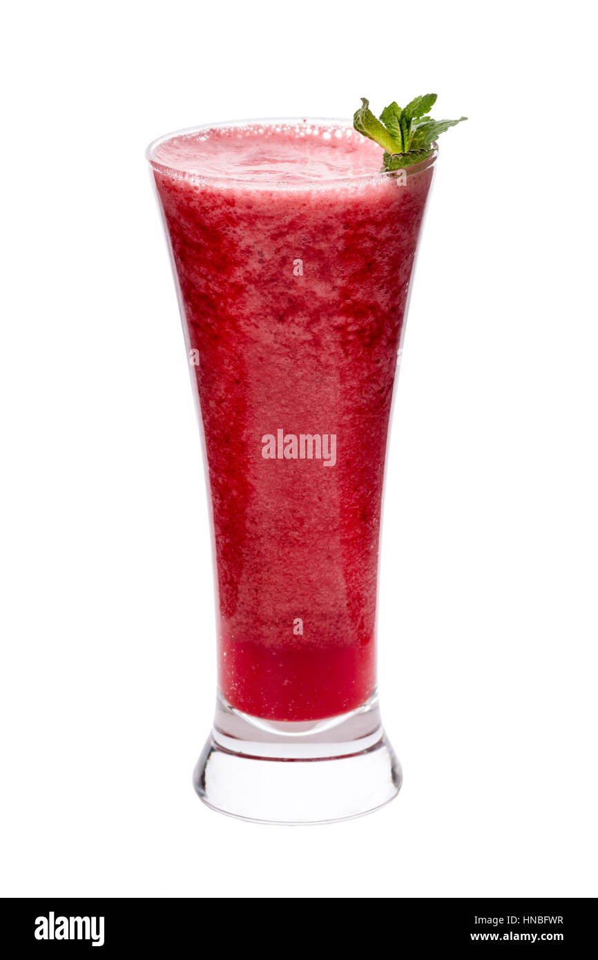 Red strawberry coctail in the long glass with mint Stock Photo