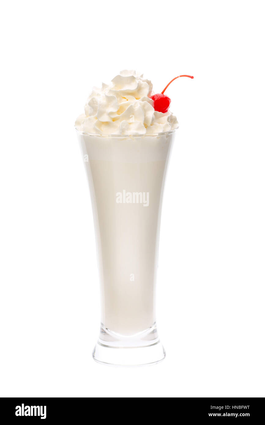 Milk coctail with whipped cream in the long glass Stock Photo